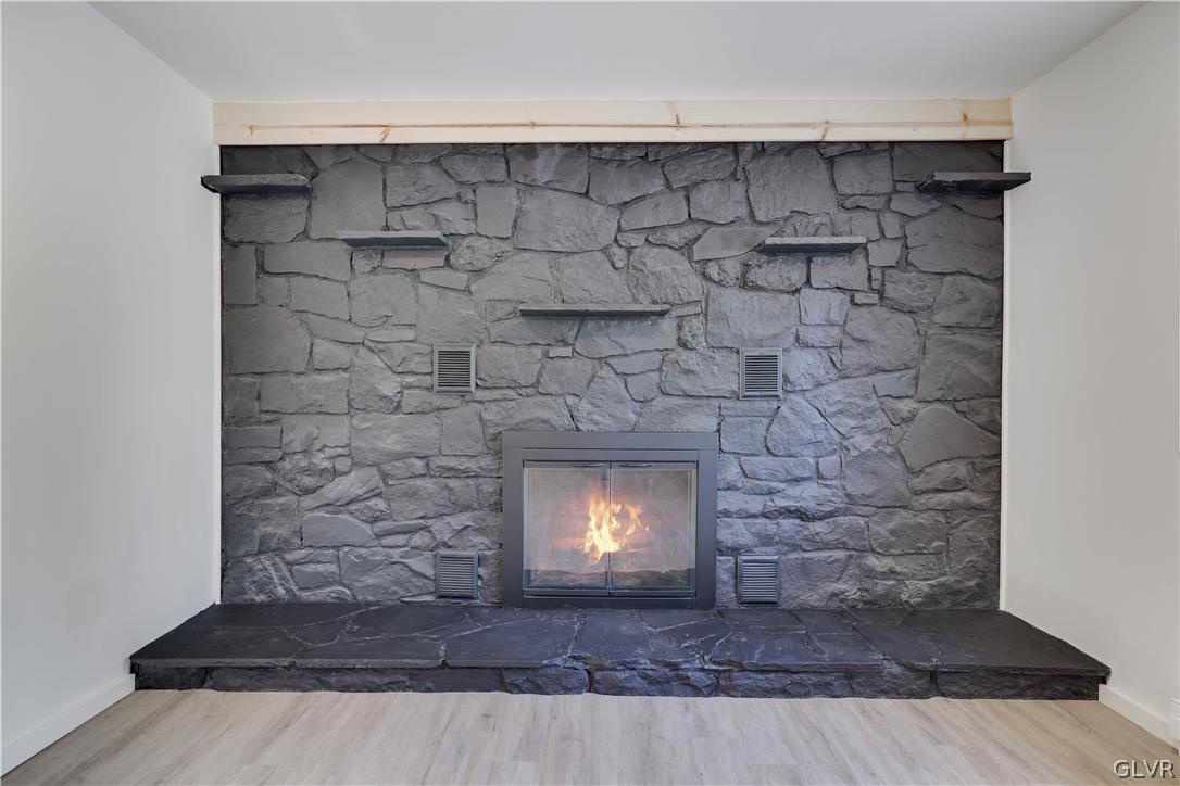 107 Barrys Road Effort, PA 18330 - Photo 6 of 32 a room with a fireplace