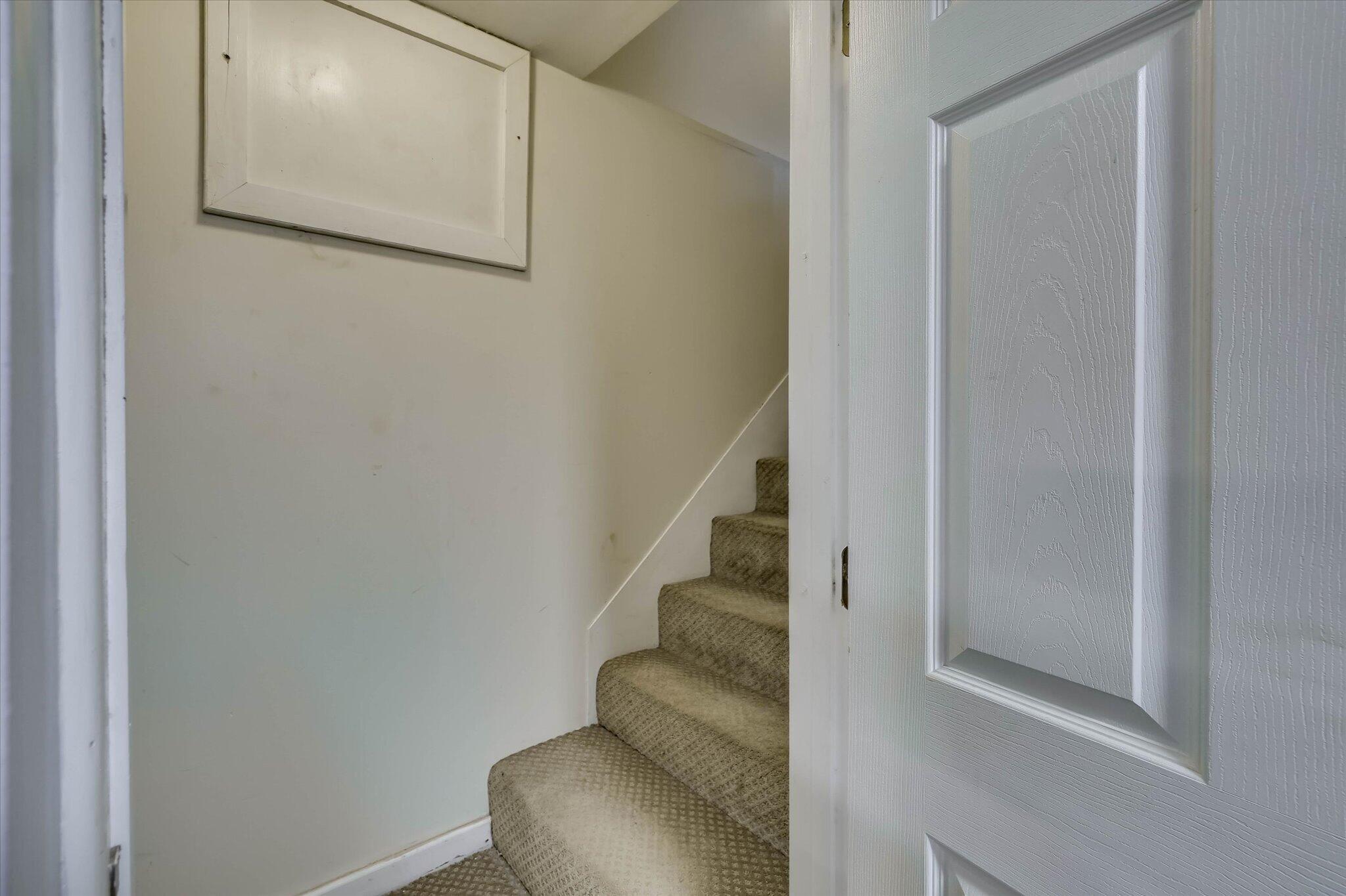 802 Hickman Road Augusta, GA 30904 - Photo 42 of 55 Staircase to laundry room and basement apartment.