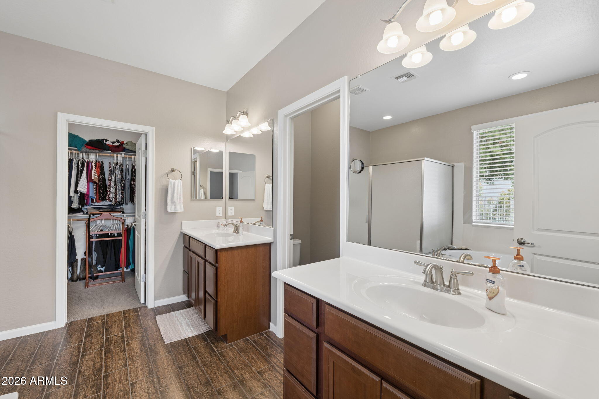 8993 West Ruth Avenue Peoria, AZ 85345 - Photo 11 of 24 a kitchen with a sink and a refrigerator