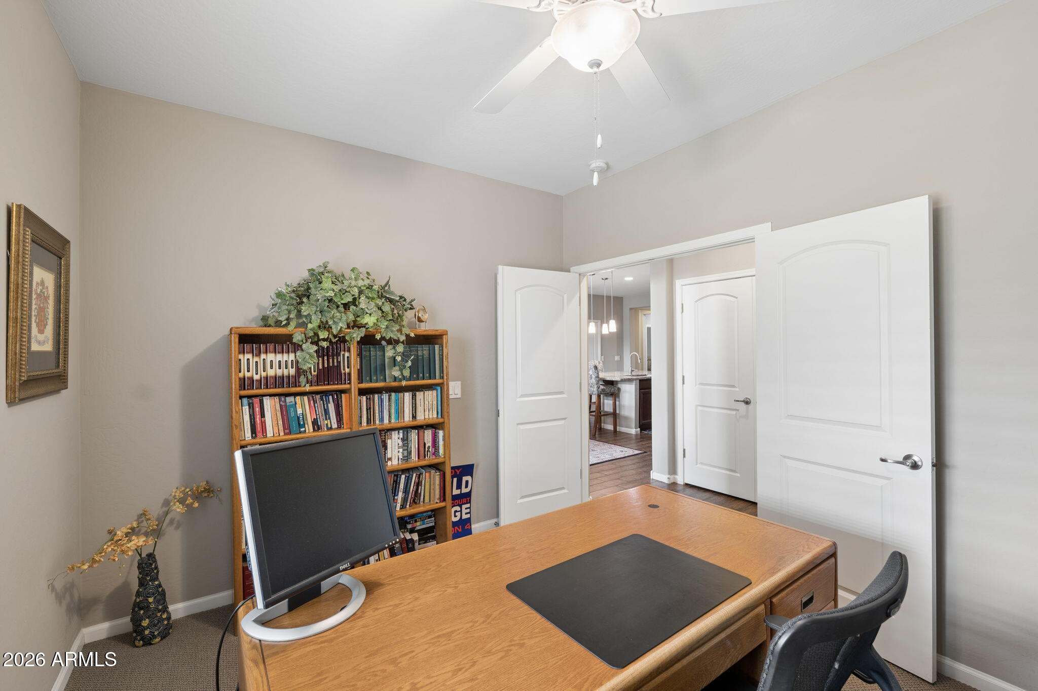8993 West Ruth Avenue Peoria, AZ 85345 - Photo 19 of 24 a view of a workspace with furniture