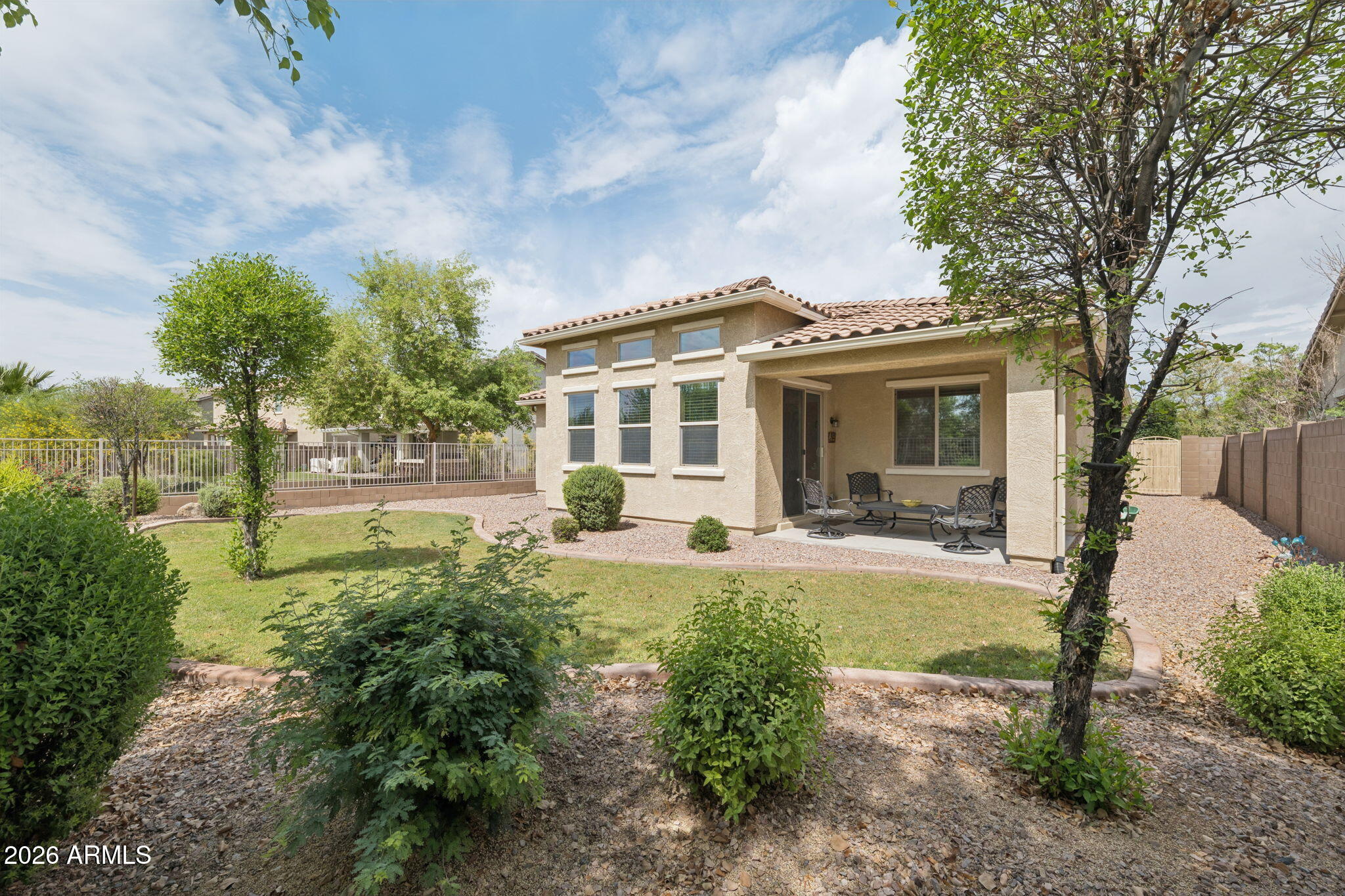 8993 West Ruth Avenue Peoria, AZ 85345 - Photo 23 of 24 front view of a house with a yard