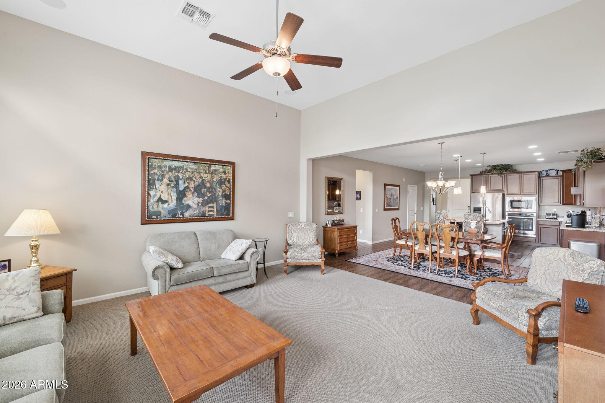 8993 West Ruth Avenue Peoria, AZ 85345 - Photo 7 of 24 a living room with furniture and a large window