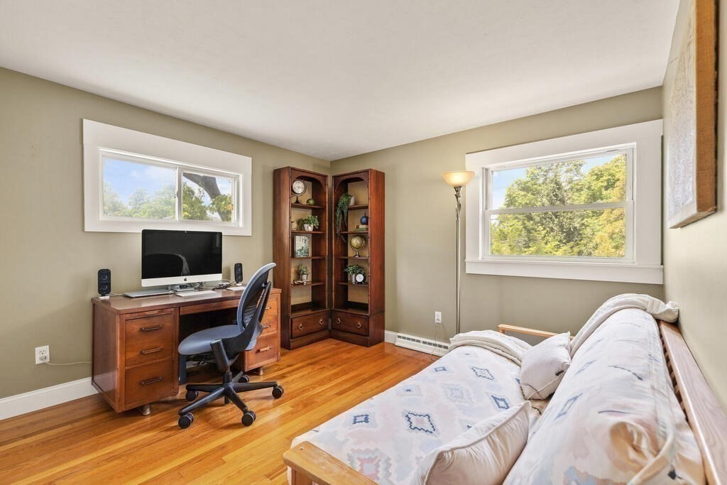 19 West Chardon Road Winchester, MA 01890 - Photo 19 of 40 a bedroom with a bed and a desk