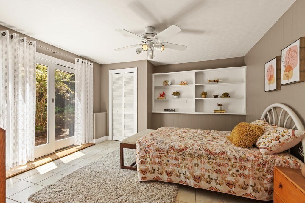 19 West Chardon Road Winchester, MA 01890 - Photo 20 of 40 a bedroom with a large bed and a window