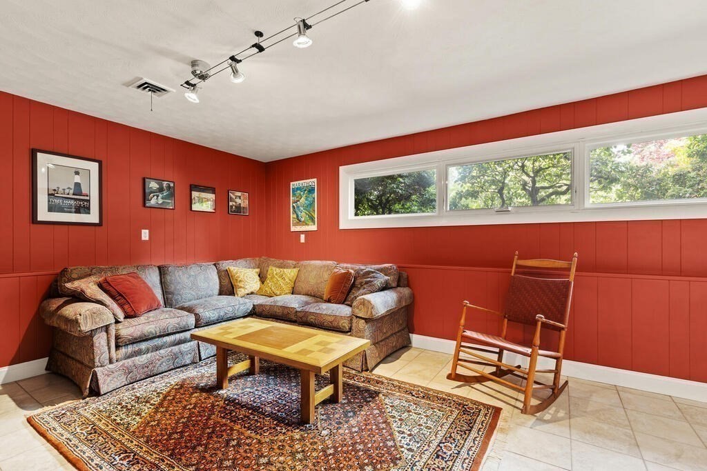 19 West Chardon Road Winchester, MA 01890 - Photo 27 of 40 a living room with furniture and a large window