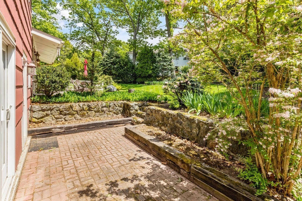 19 West Chardon Road Winchester, MA 01890 - Photo 29 of 40 a view of a back yard of the house