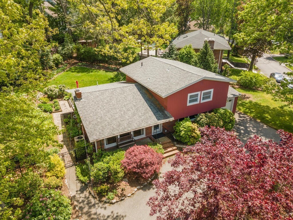 19 West Chardon Road Winchester, MA 01890 - Photo 32 of 40 front view of a house with a yard