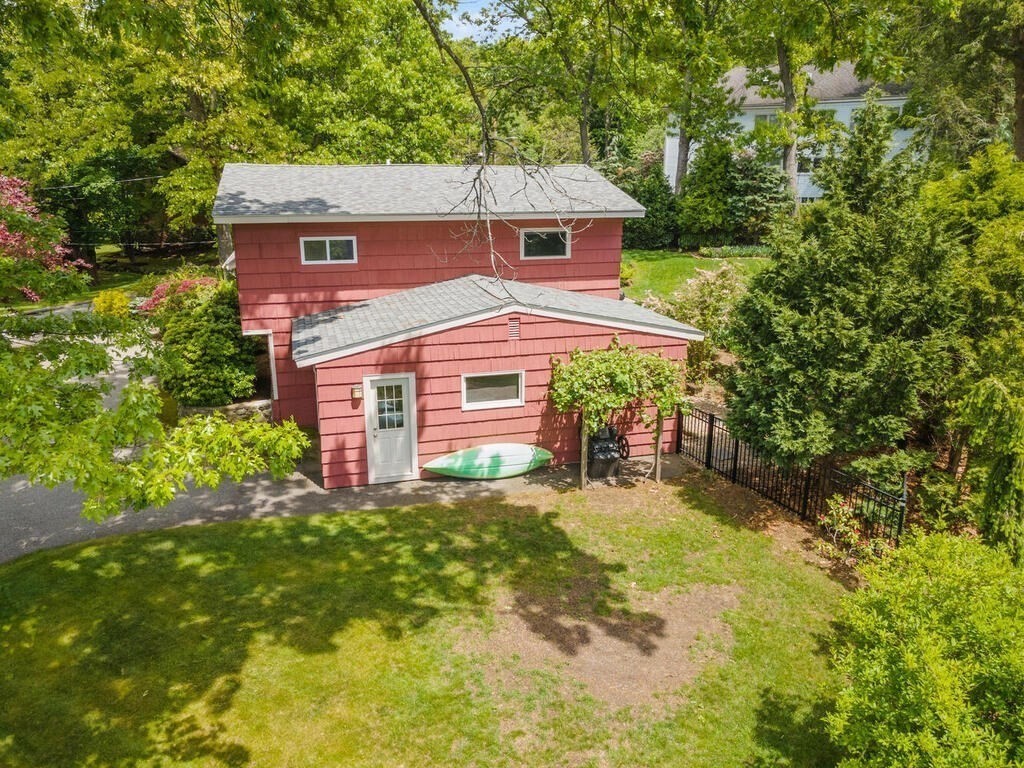 19 West Chardon Road Winchester, MA 01890 - Photo 34 of 40 a view of a house with a yard and sitting area