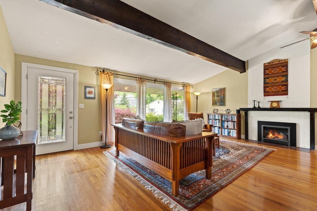 19 West Chardon Road Winchester, MA 01890 - Photo 5 of 40 a living room with furniture and a fireplace