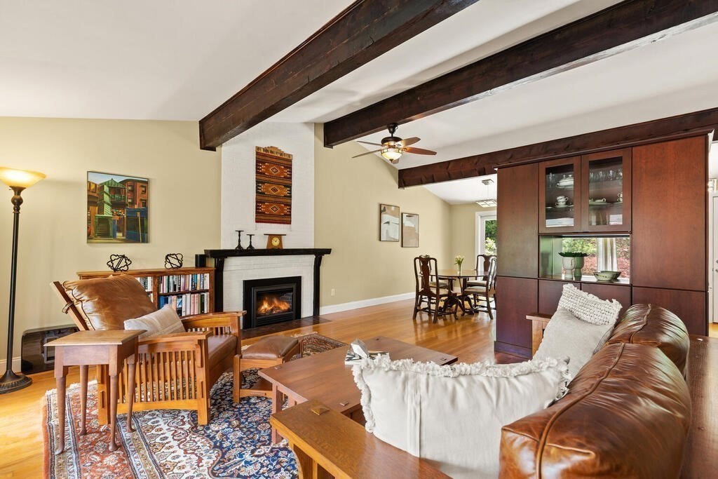 19 West Chardon Road Winchester, MA 01890 - Photo 6 of 40 a living room with furniture fireplace and dining table