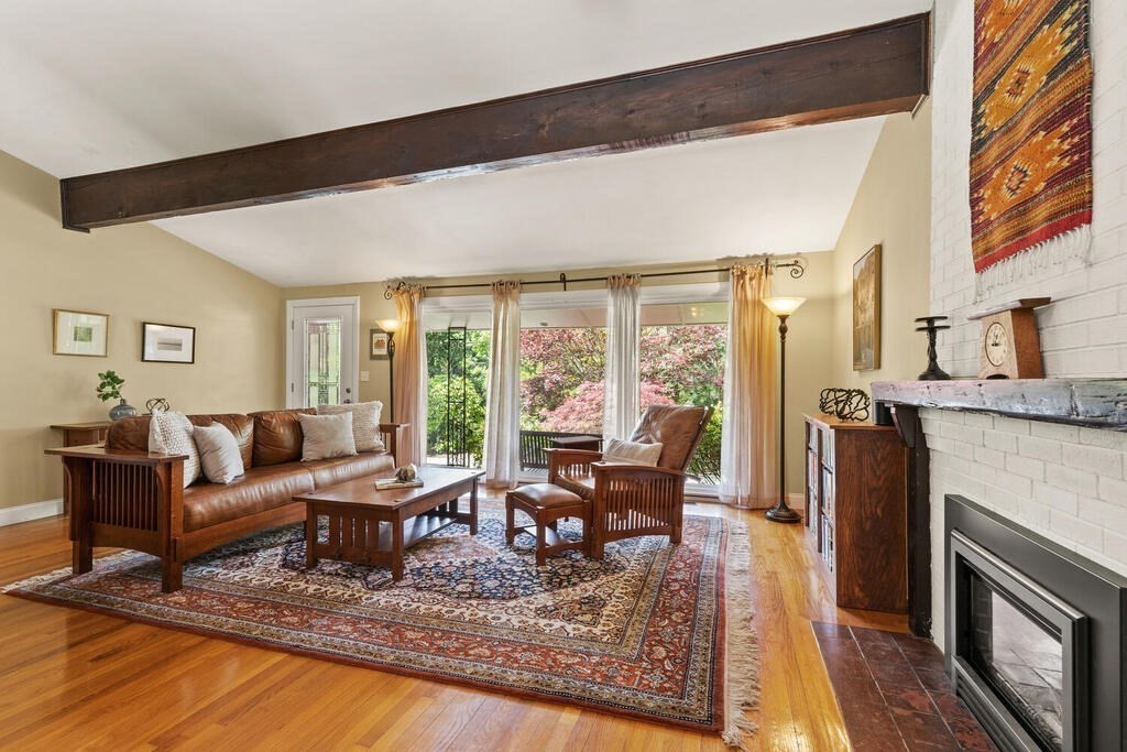 19 West Chardon Road Winchester, MA 01890 - Photo 9 of 40 a living room with fireplace furniture and a rug