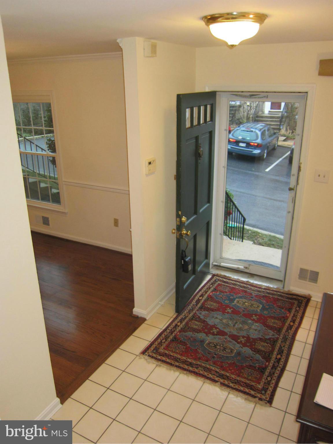 2208 Bucknell Terrace, Unit 24 Silver Spring, MD 20902 - Photo 3 of 28 Tiled foyer, storm door at front