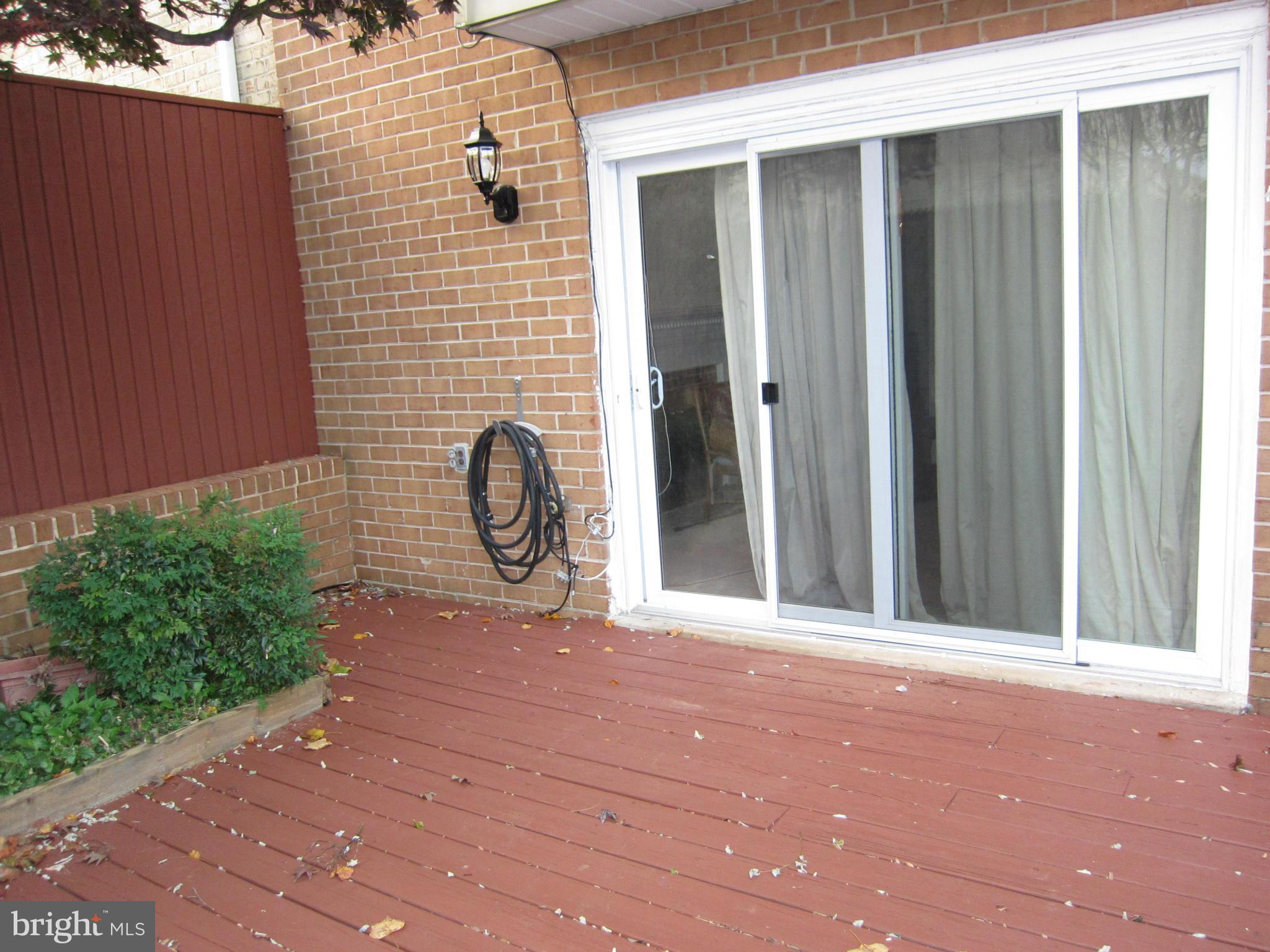 2208 Bucknell Terrace, Unit 24 Silver Spring, MD 20902 - Photo 27 of 28 Newer sliders for entrance to LL