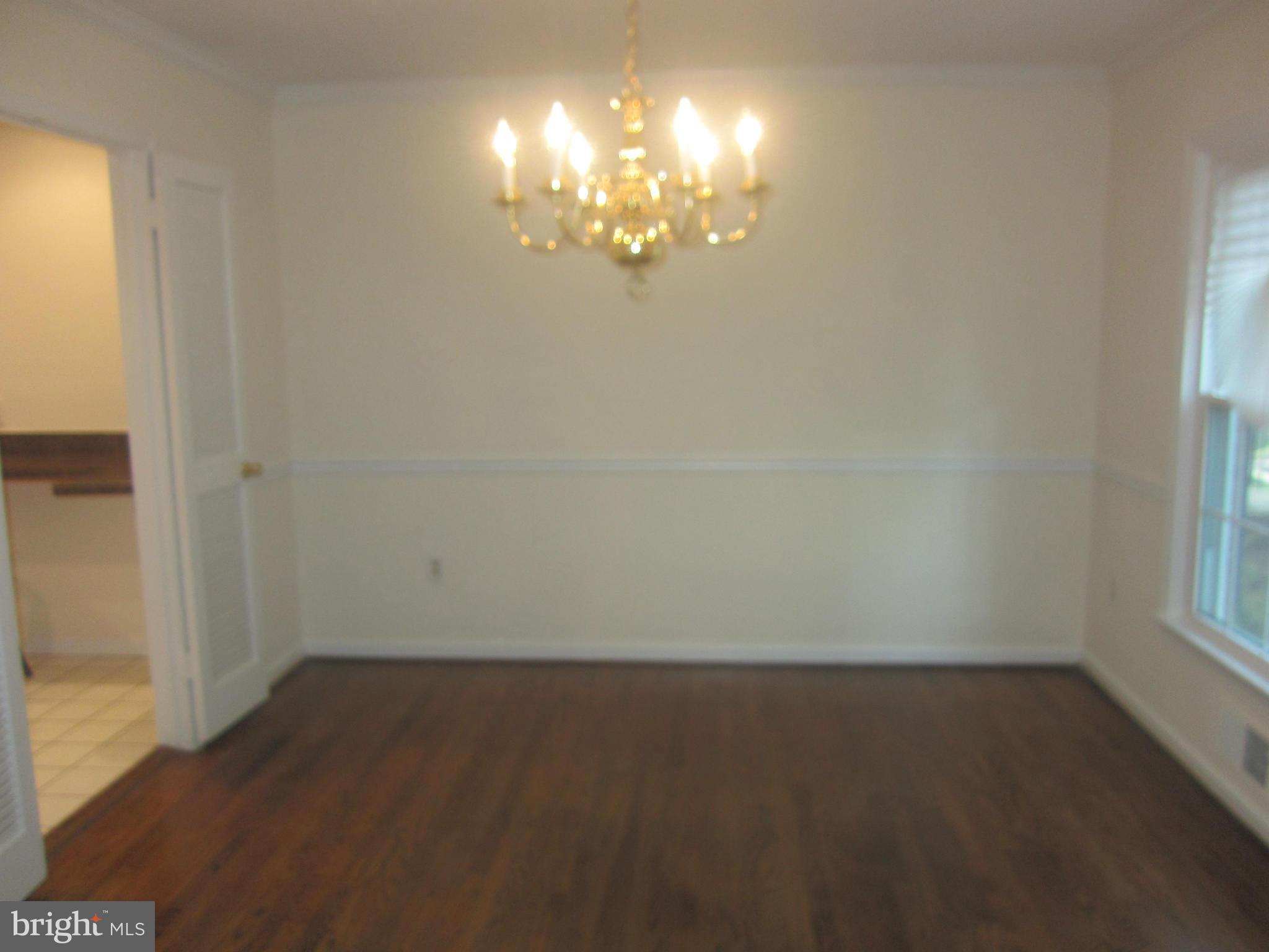 2208 Bucknell Terrace, Unit 24 Silver Spring, MD 20902 - Photo 5 of 28 Dining room with moldings, doors to kitchen