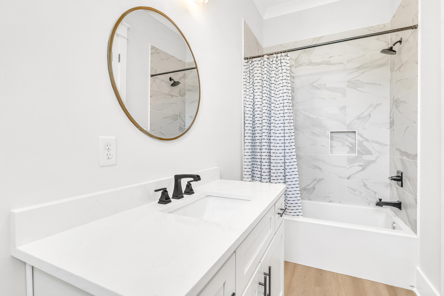 101 Carson Ln Inlet Beach Inlet Beach, FL 32461 - Photo 54 of 58 a bathroom with a sink a tub and a mirror