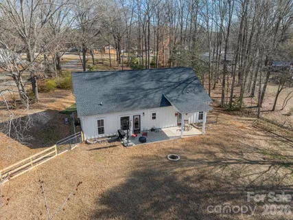 a view of house with outdoor space