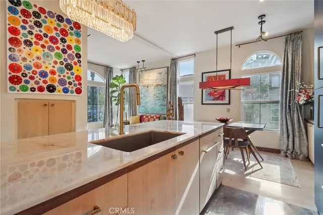 a view of a livingroom with furniture and windows