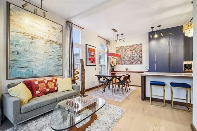 a view of backyard with a table and chairs and a large tree