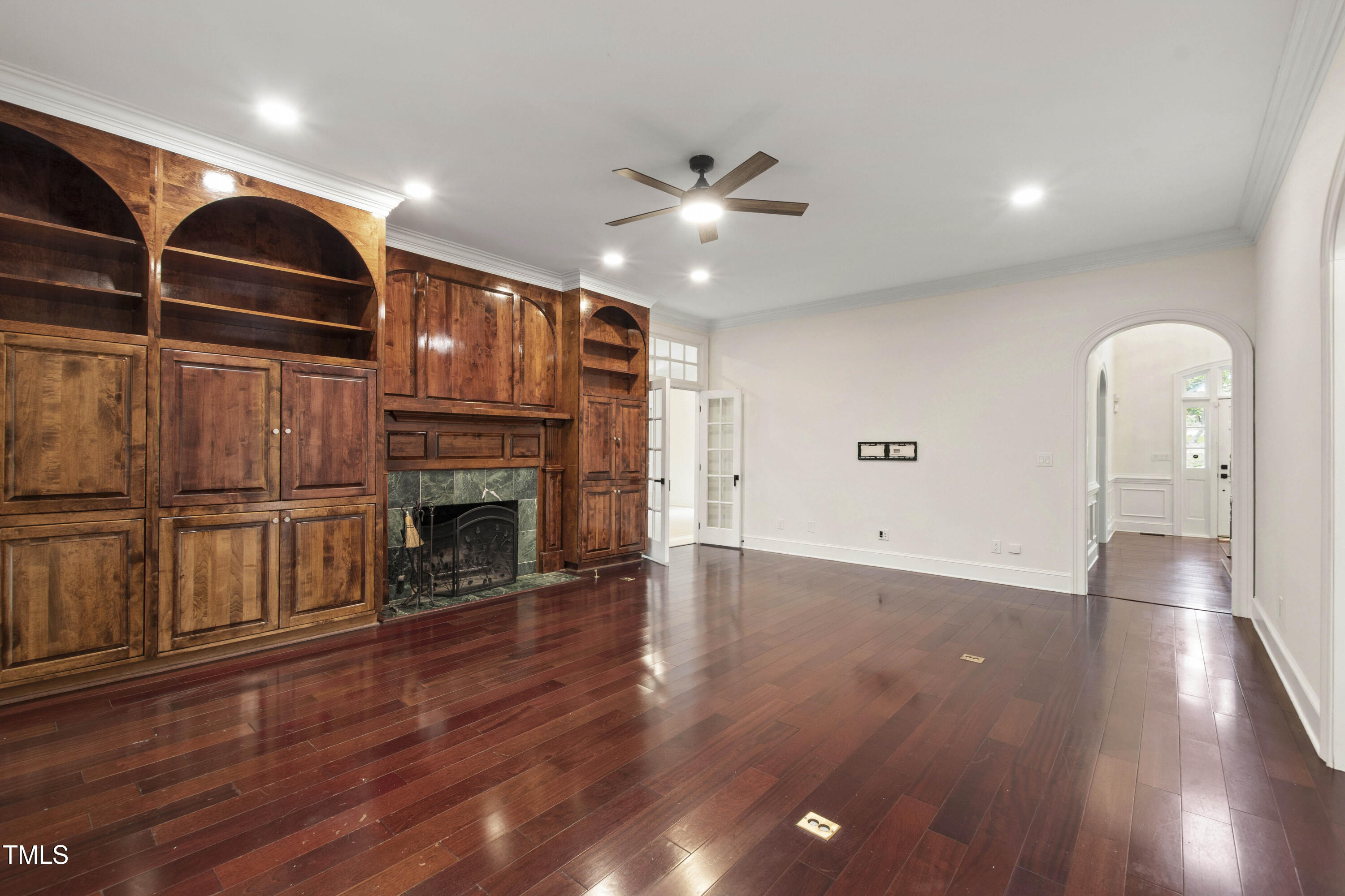 636 Pendleton Lake Road Raleigh, NC 27614 - Photo 9 of 88 a view of a livingroom with fireplace and wooden floor