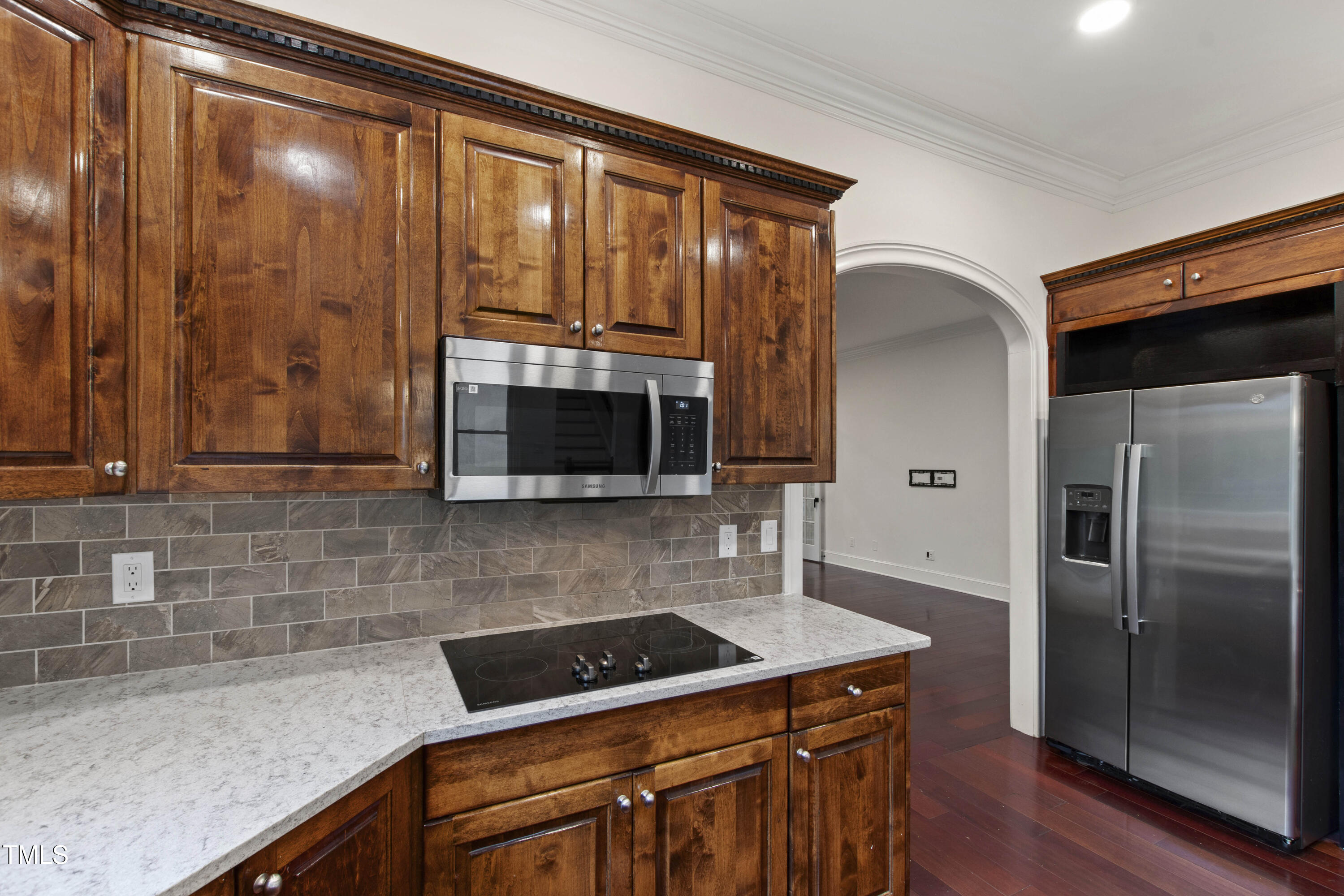 636 Pendleton Lake Road Raleigh, NC 27614 - Photo 16 of 88 a kitchen with a refrigerator and a microwave