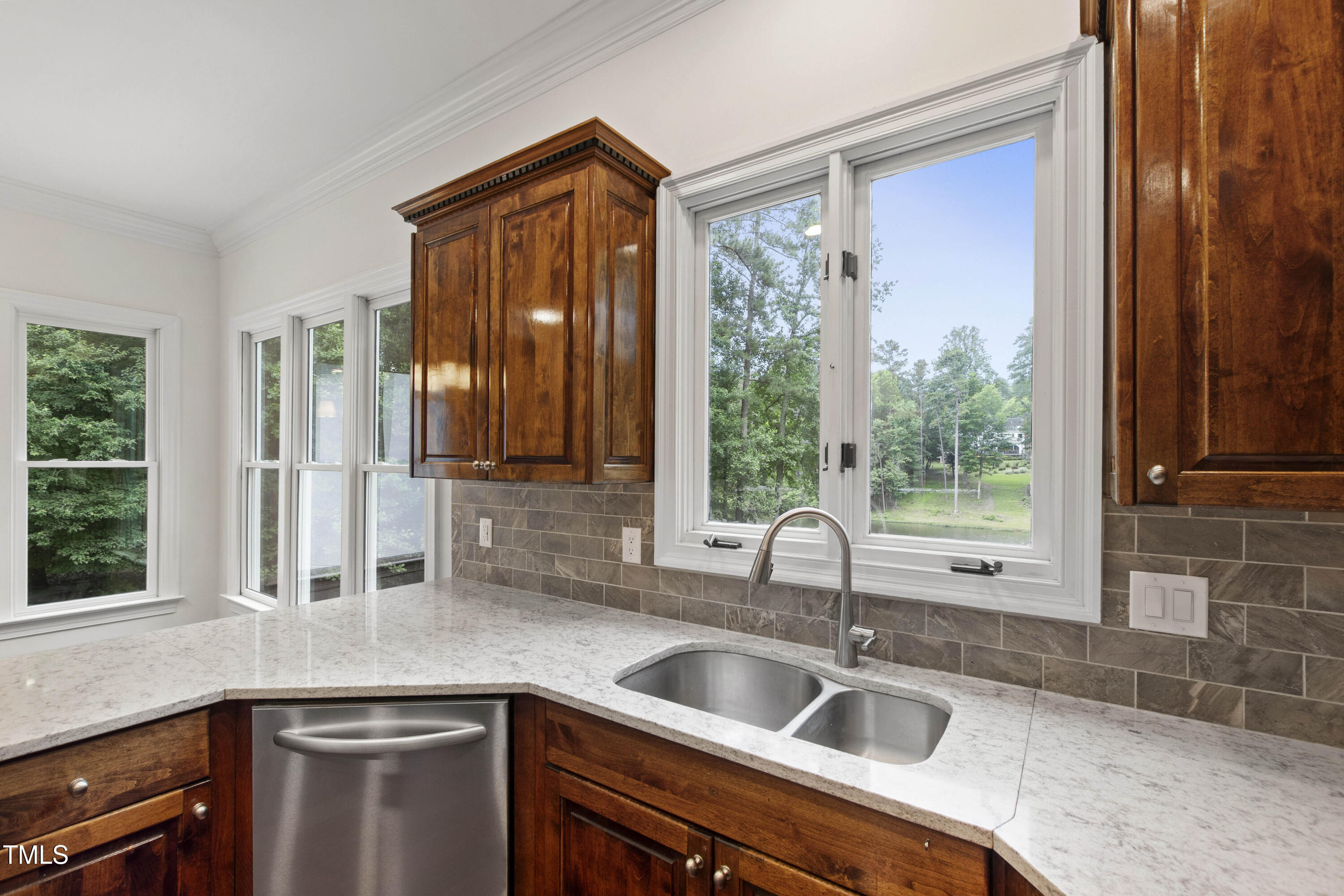 636 Pendleton Lake Road Raleigh, NC 27614 - Photo 18 of 88 a kitchen with a sink and large window