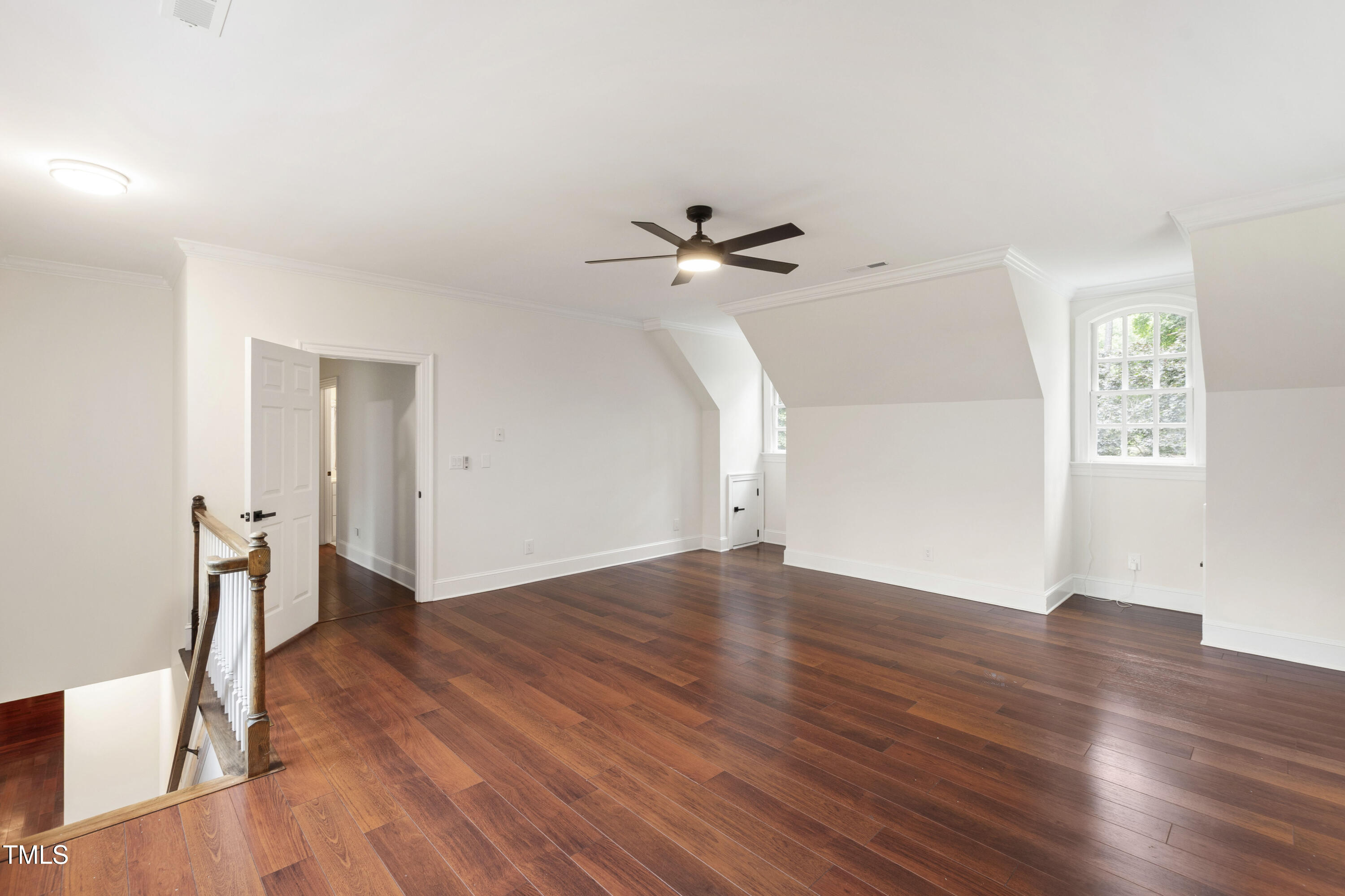 636 Pendleton Lake Road Raleigh, NC 27614 - Photo 34 of 88 an empty room with wooden floor and ceiling fan