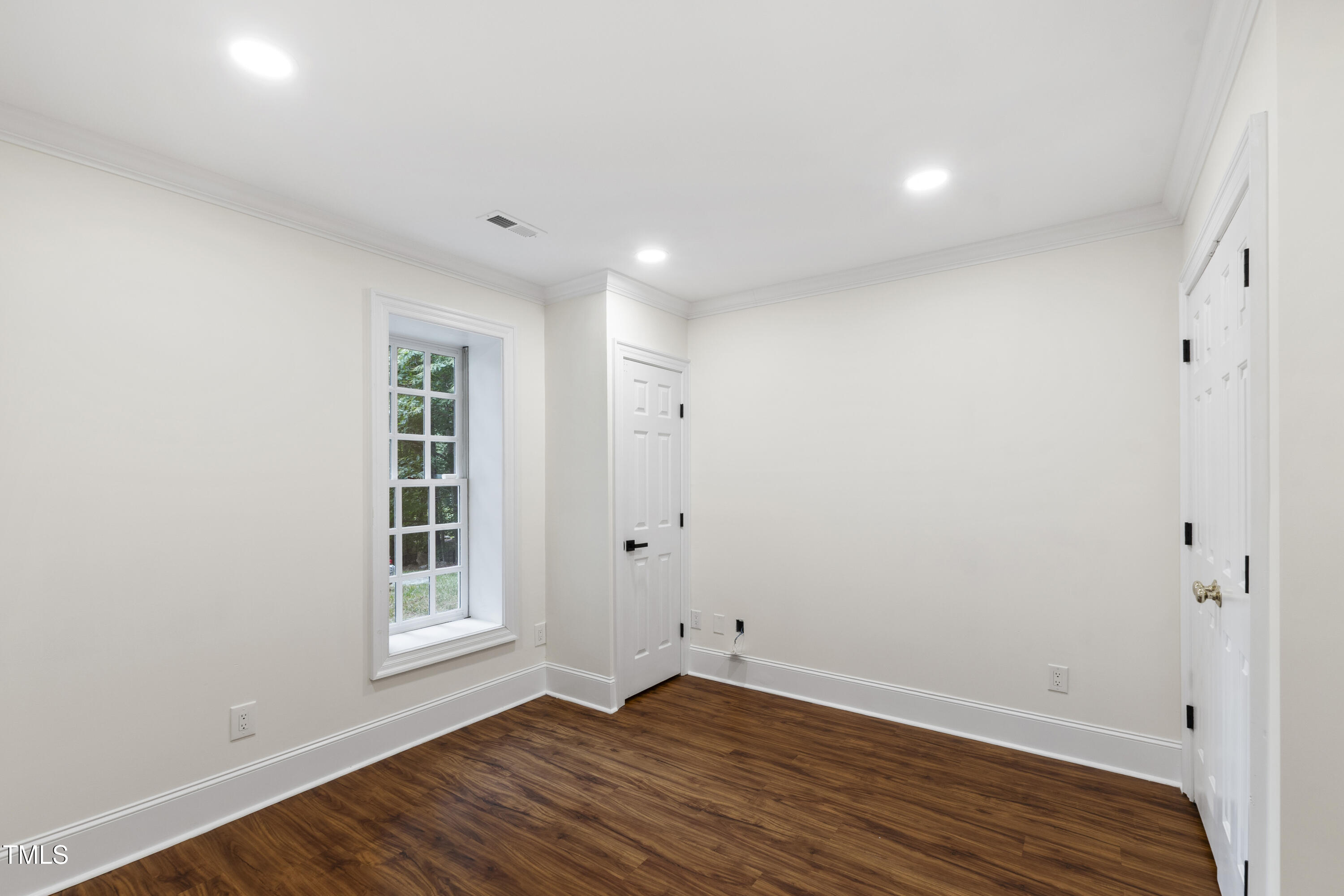 636 Pendleton Lake Road Raleigh, NC 27614 - Photo 47 of 88 wooden floor in an empty room with a window