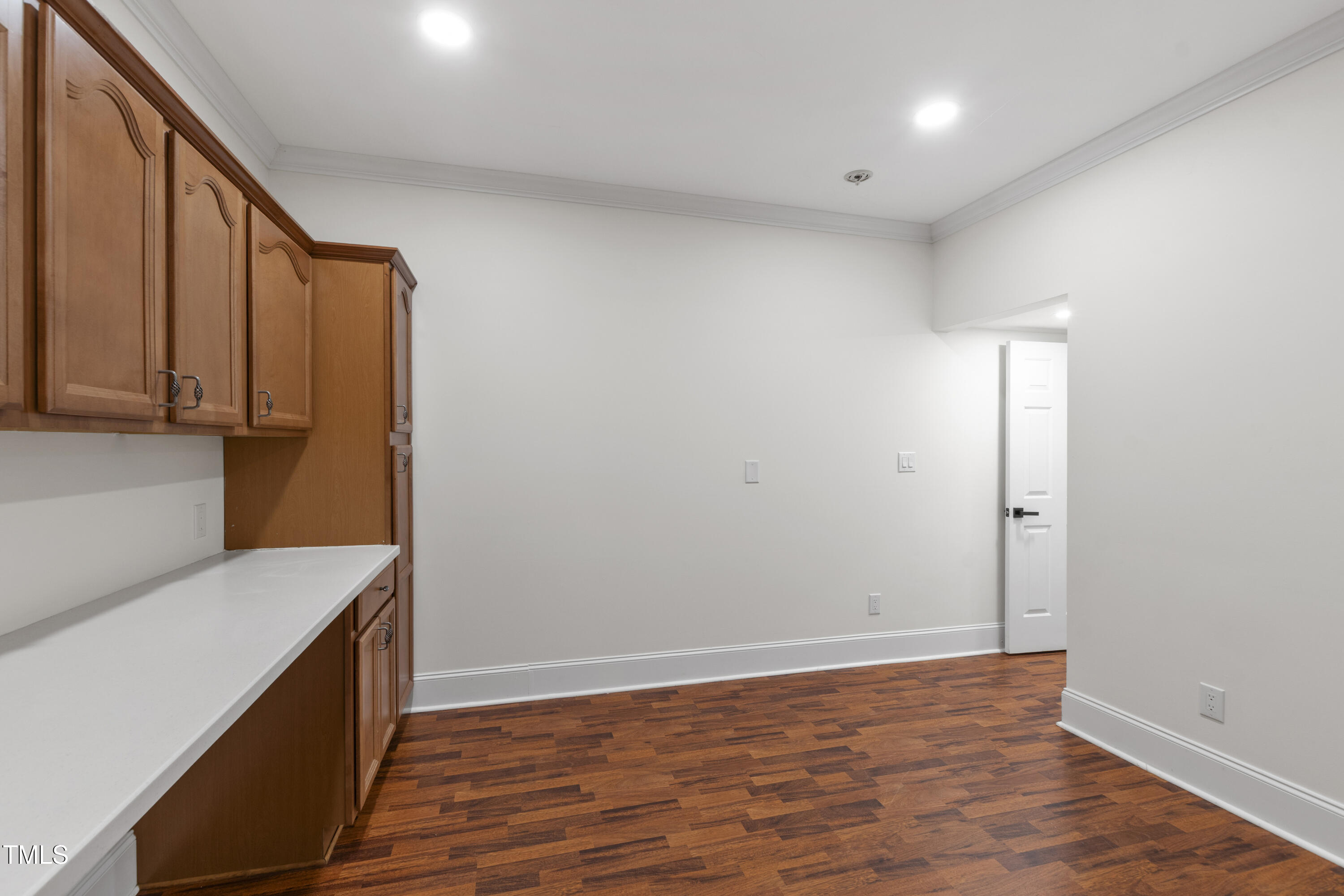 636 Pendleton Lake Road Raleigh, NC 27614 - Photo 50 of 88 a view of storage and utility room in wooden floor