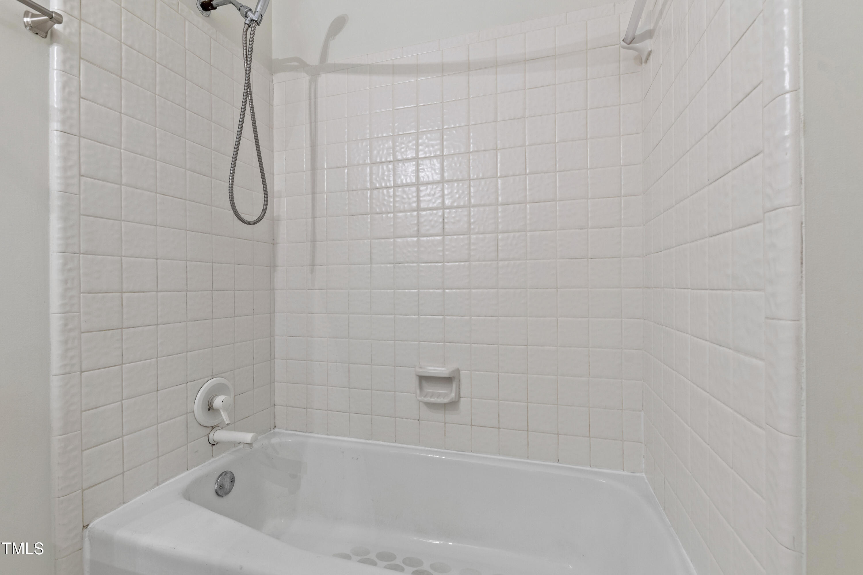 636 Pendleton Lake Road Raleigh, NC 27614 - Photo 59 of 88 a bathroom with a bath tub with a shower