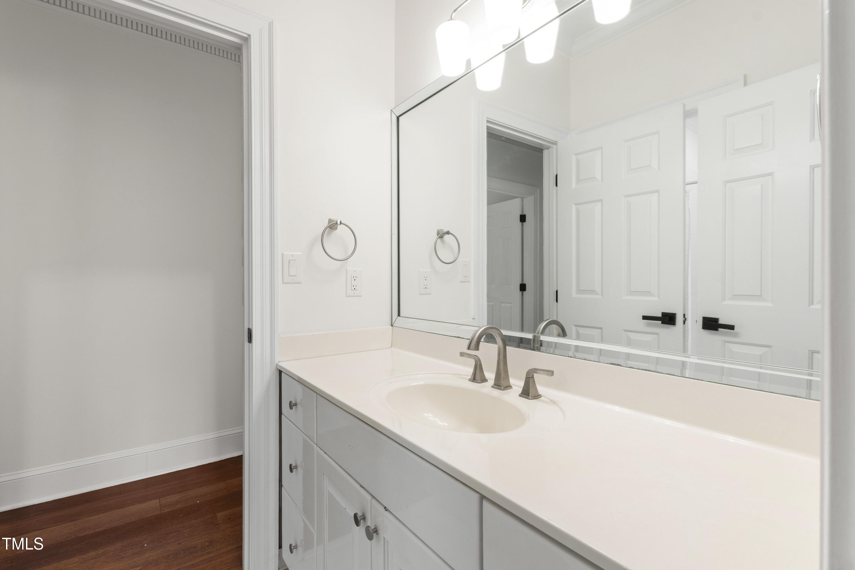 636 Pendleton Lake Road Raleigh, NC 27614 - Photo 65 of 88 a bathroom with a sink and a mirror