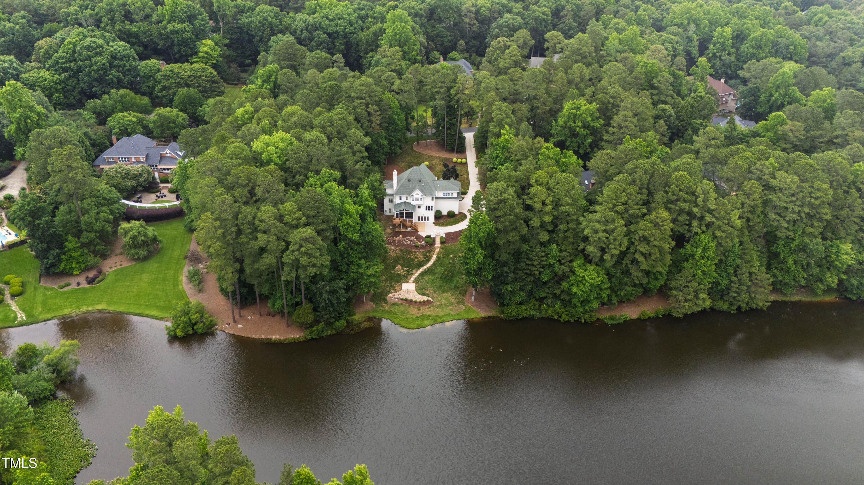 636 Pendleton Lake Road Raleigh, NC 27614 - Photo 74 of 88 an aerial view of a house with a yard and lake view