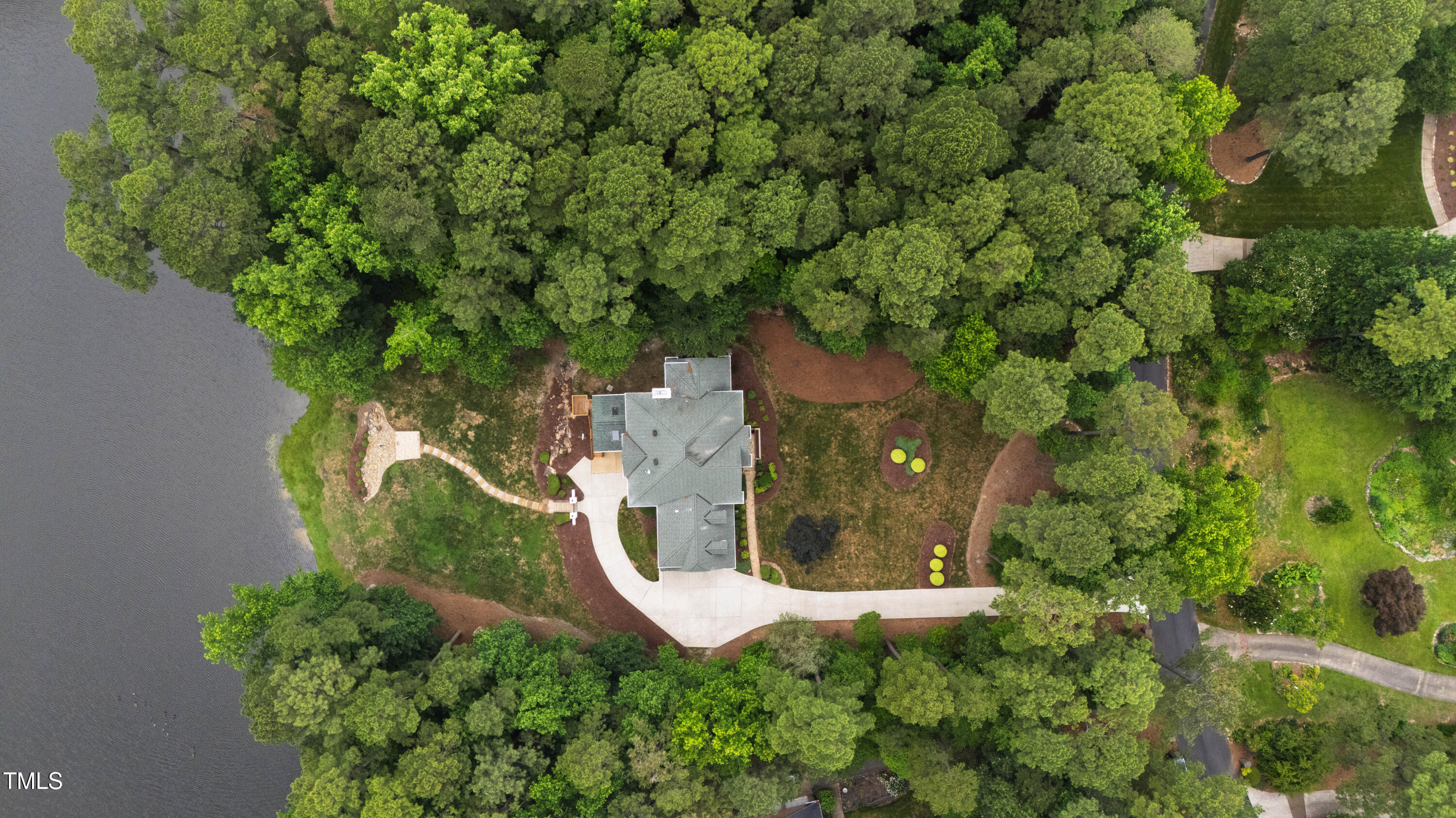 636 Pendleton Lake Road Raleigh, NC 27614 - Photo 77 of 88 an aerial view of a house with a yard and trees