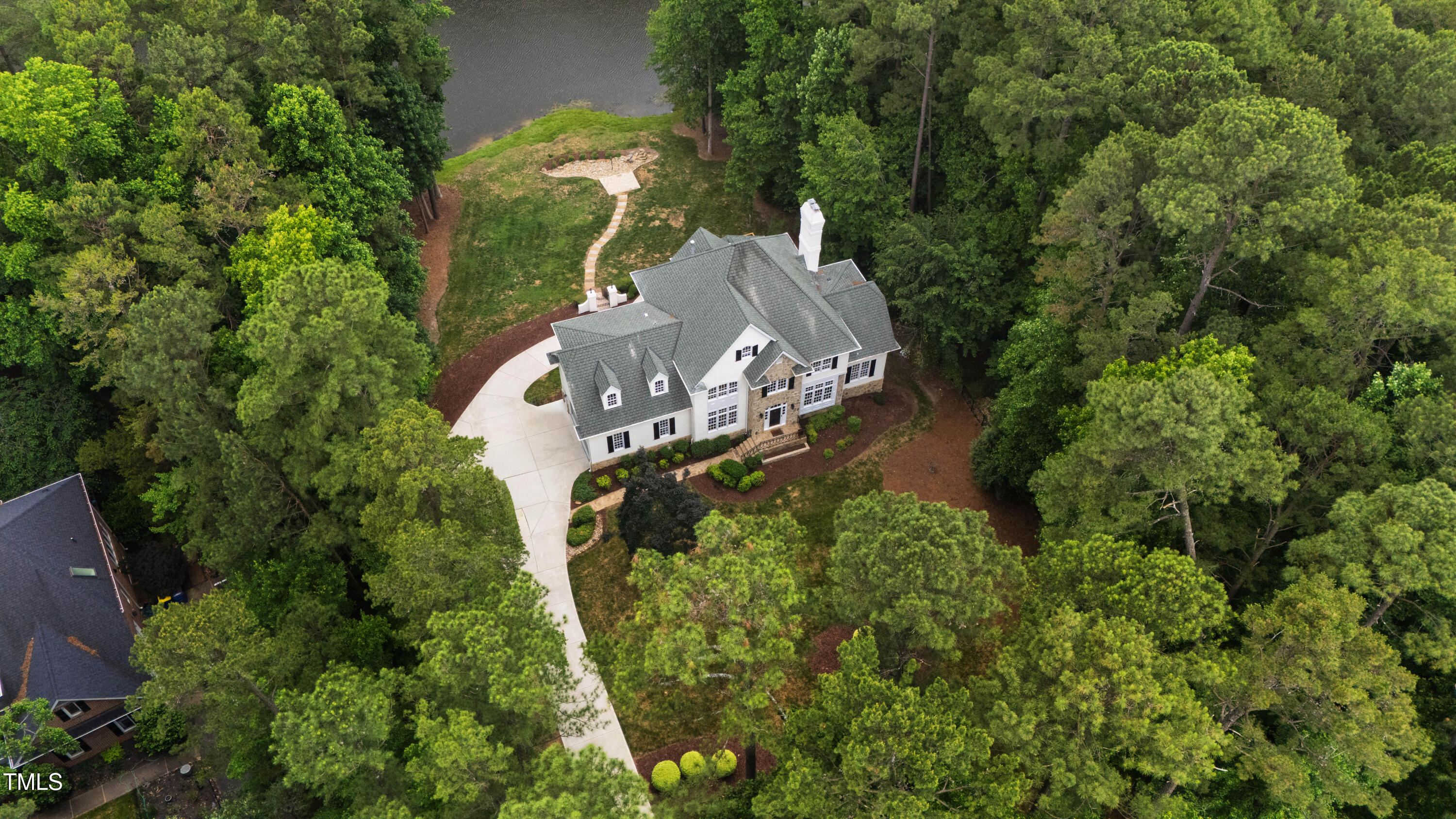636 Pendleton Lake Road Raleigh, NC 27614 - Photo 79 of 88 an aerial view of a house with a yard and large trees