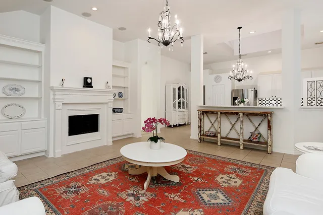 a view of hall way with furniture