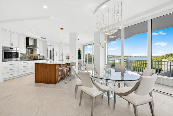 a view of a dining room with furniture window and outside view
