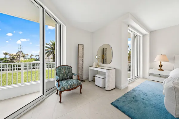 a bathroom with a granite countertop sink a mirror and a shower