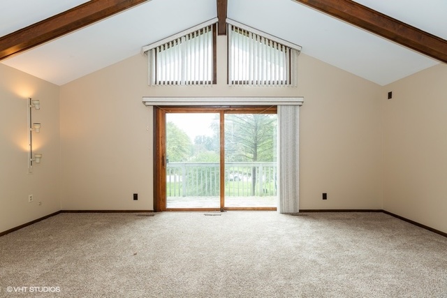 3017 Springbrook Road Crystal Lake, IL 60012 - Photo 11 of 20 a view of an empty room with a window