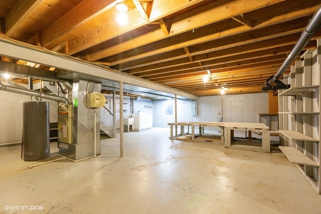 3017 Springbrook Road Crystal Lake, IL 60012 - Photo 18 of 20 a view of a garage with furniture