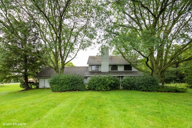 3017 Springbrook Road Crystal Lake, IL 60012 - Photo 20 of 20 a view of a house with a yard
