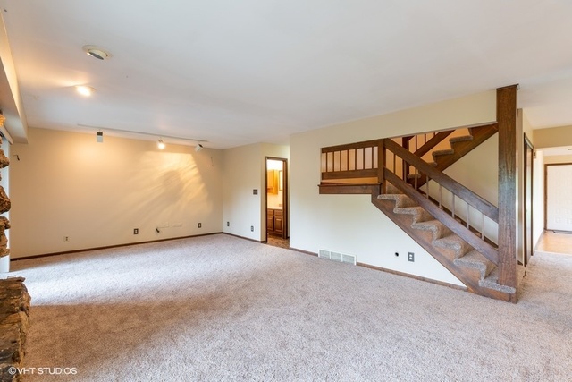 3017 Springbrook Road Crystal Lake, IL 60012 - Photo 9 of 20 an empty room with windows