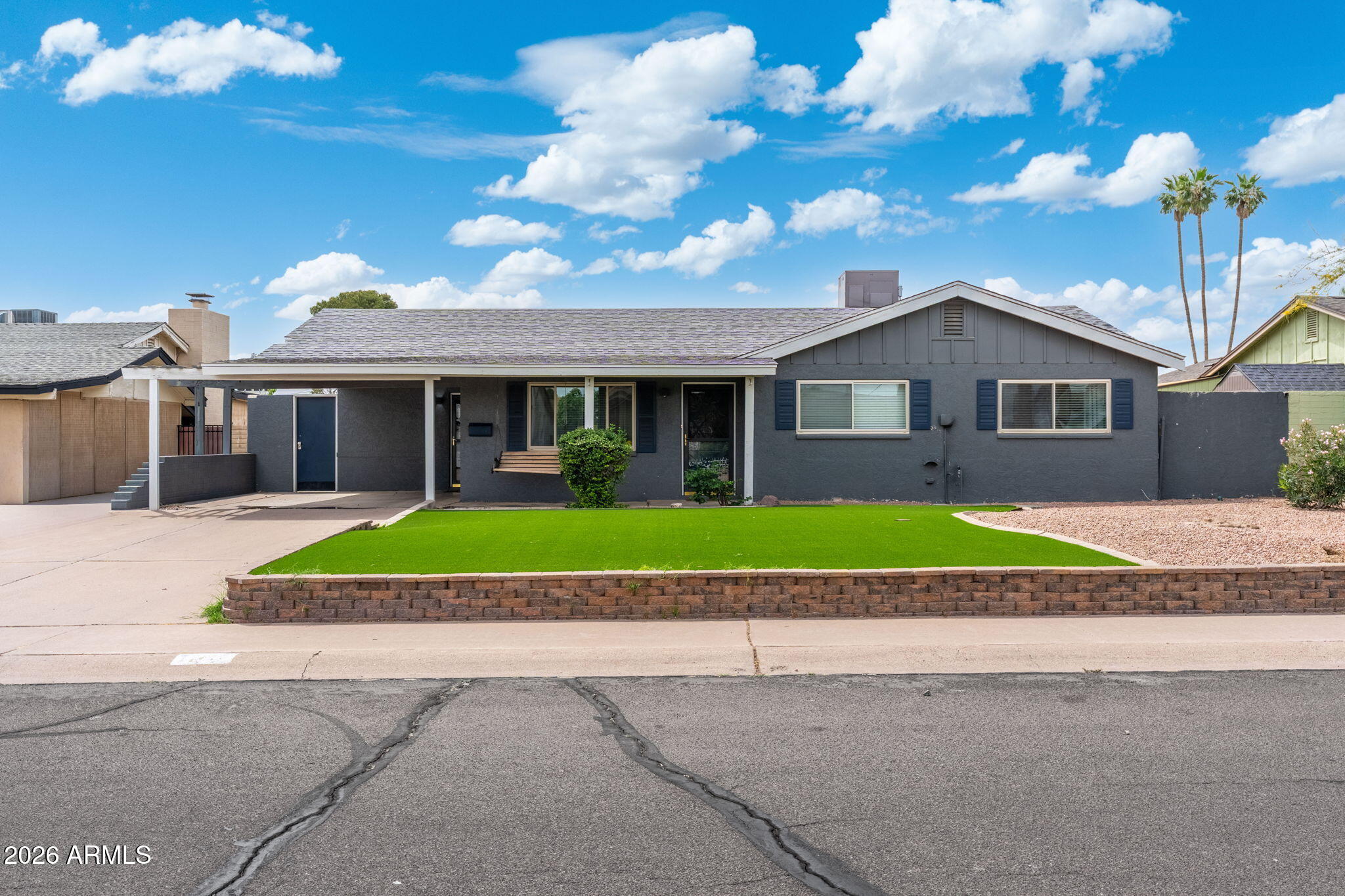 133 East Pierce Street Tempe, AZ 85288 - Photo 1 of 37 a view of house with a yard