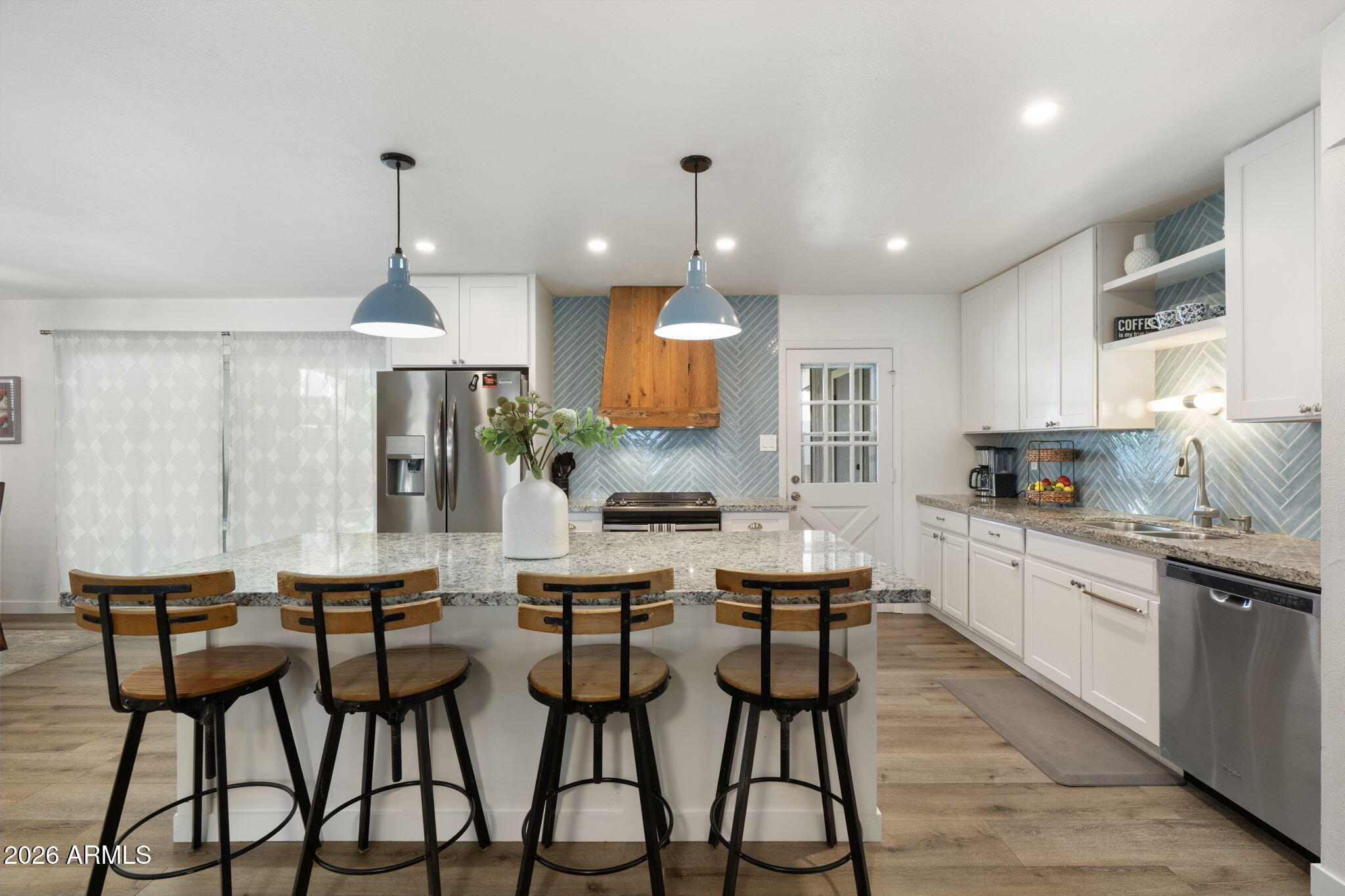 133 East Pierce Street Tempe, AZ 85288 - Photo 13 of 37 a large kitchen with a table and chairs