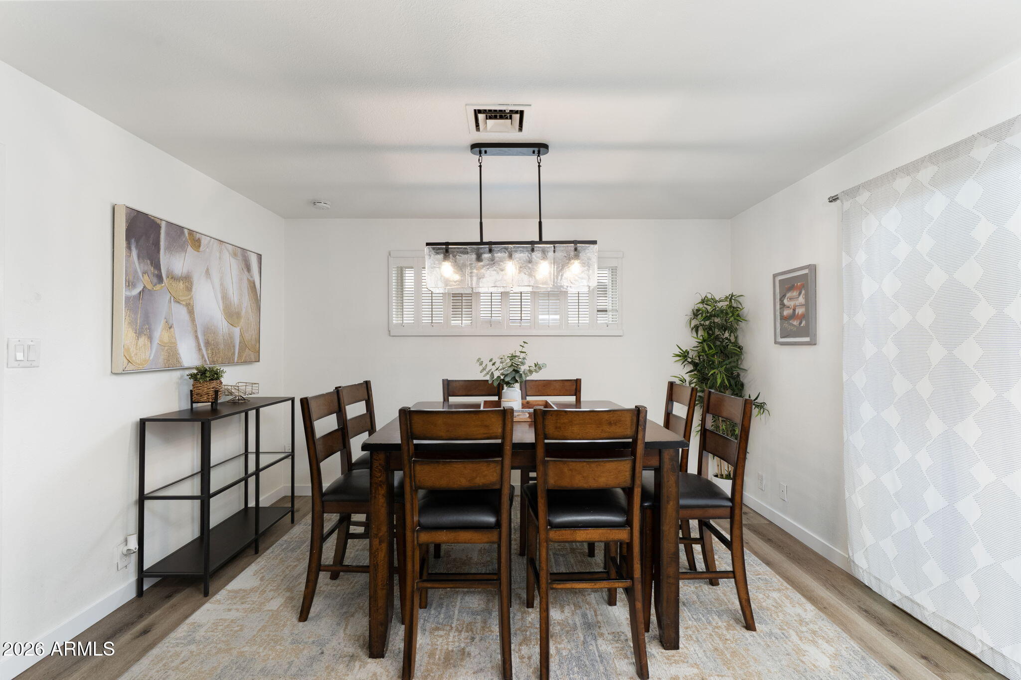 133 East Pierce Street Tempe, AZ 85288 - Photo 16 of 37 a view of a dining room with furniture window and chandelier