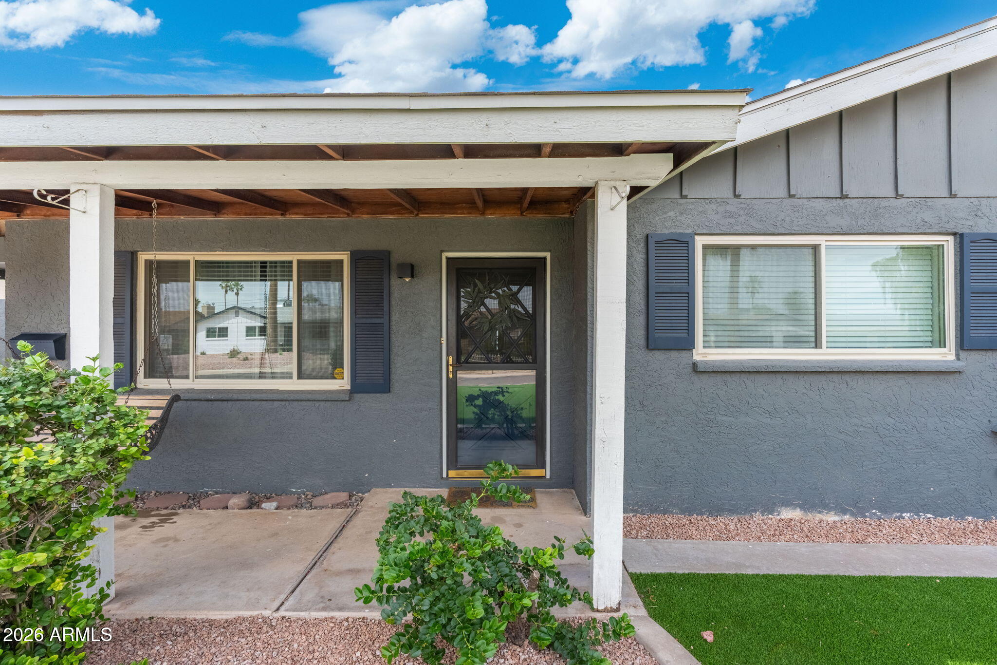 133 East Pierce Street Tempe, AZ 85288 - Photo 2 of 37 a front view of a house with a yard