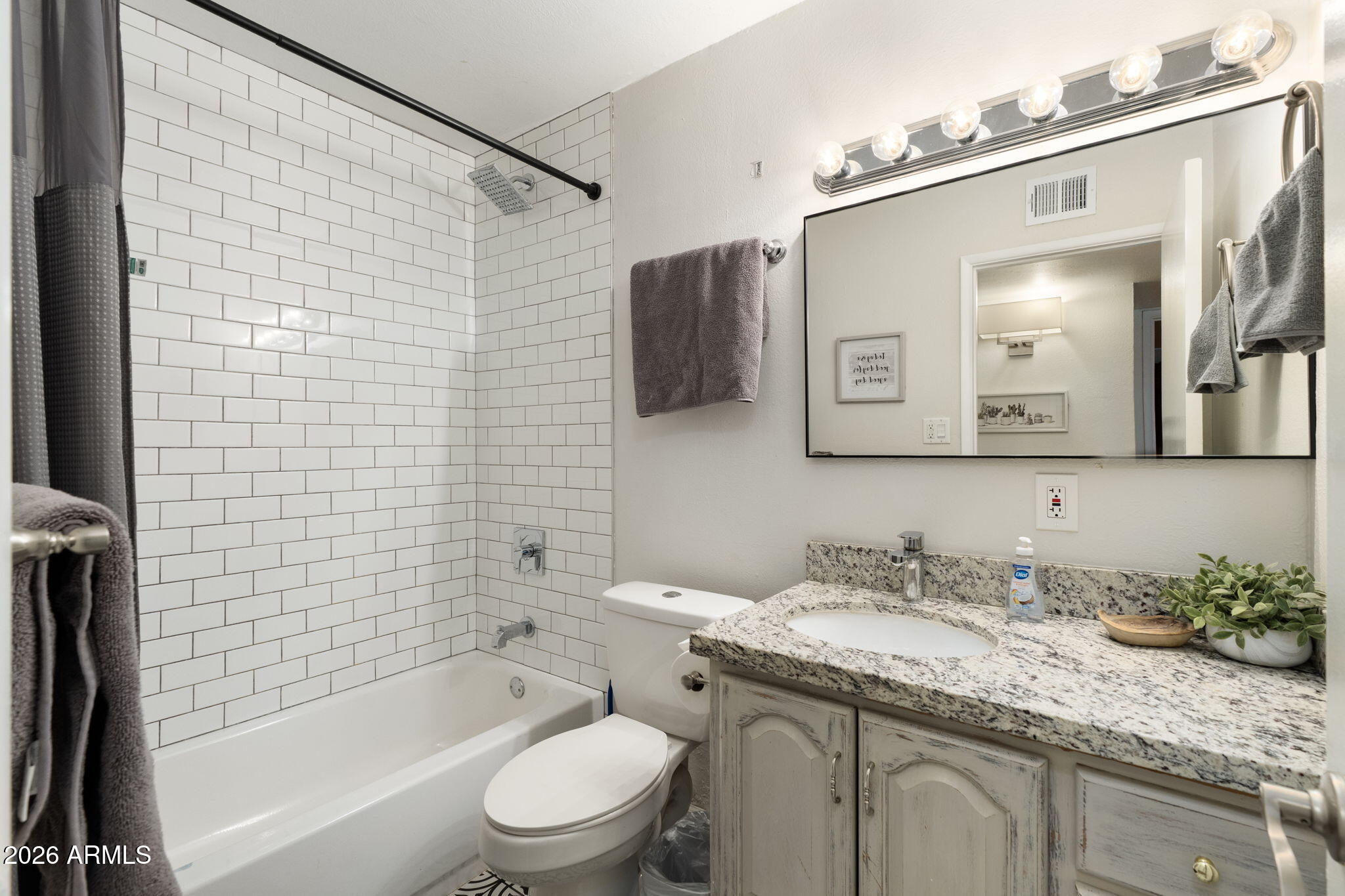 133 East Pierce Street Tempe, AZ 85288 - Photo 21 of 37 a bathroom with a granite countertop sink toilet and shower