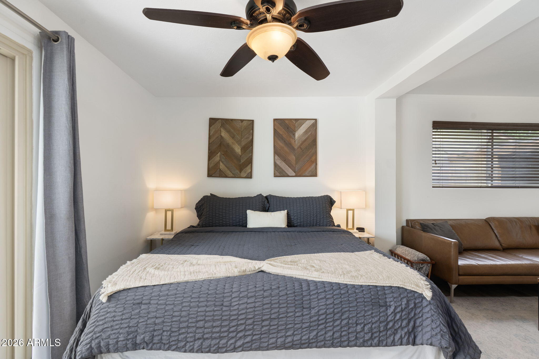 133 East Pierce Street Tempe, AZ 85288 - Photo 24 of 37 a bedroom with a bed and ceiling fan