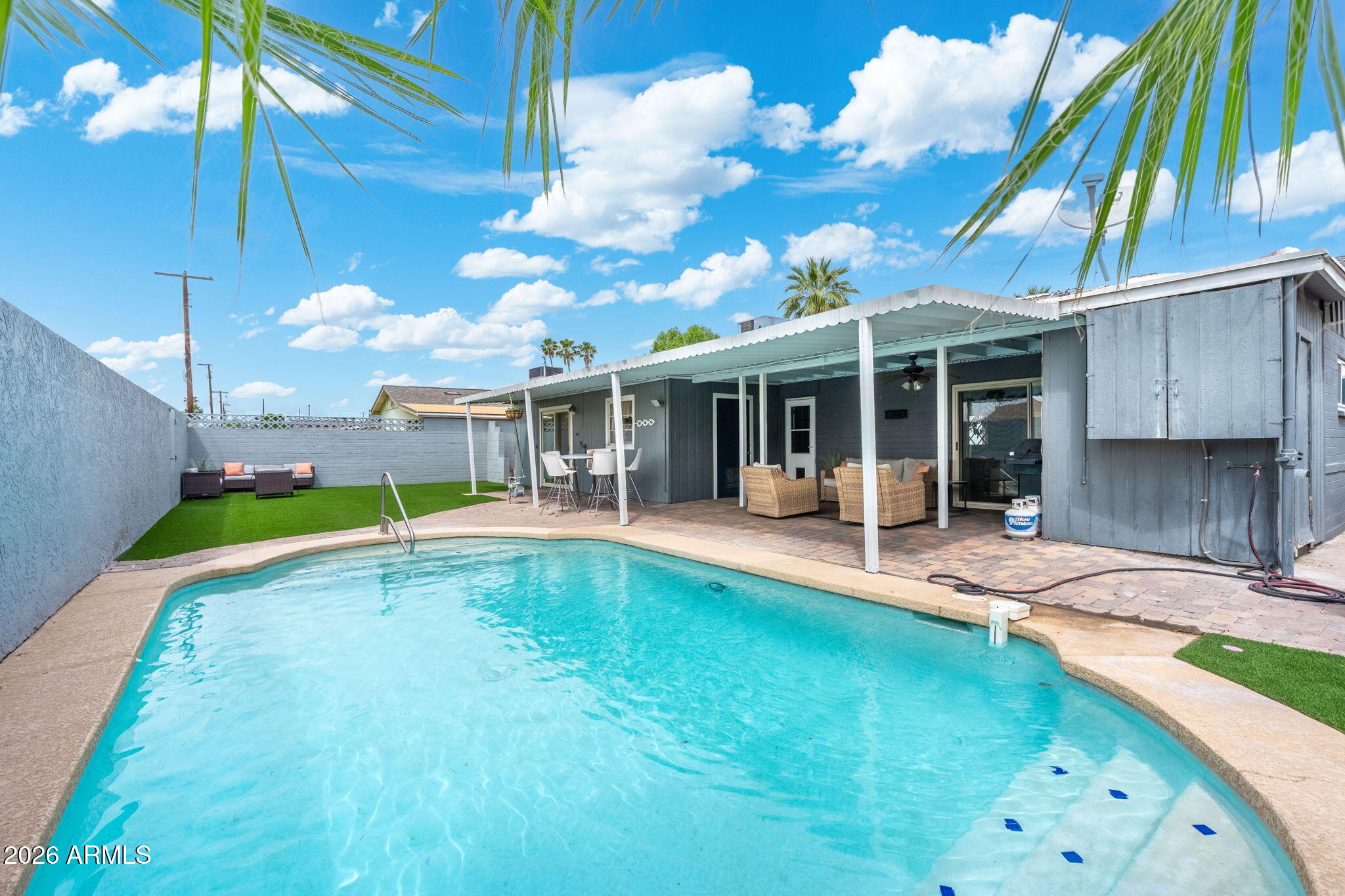 133 East Pierce Street Tempe, AZ 85288 - Photo 31 of 37 a view of a house with swimming pool