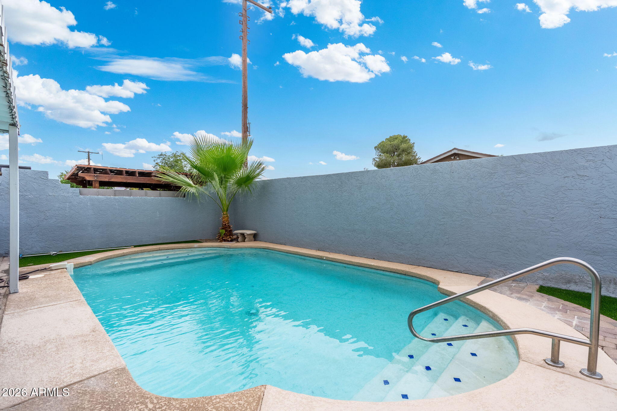 133 East Pierce Street Tempe, AZ 85288 - Photo 32 of 37 a view of a room with a swimming pool and wooden floor