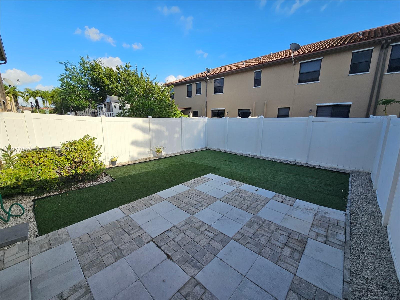 3370 West 90th Street, Unit A Hialeah, FL 33018 - Photo 10 of 40 a view of a back yard of the house