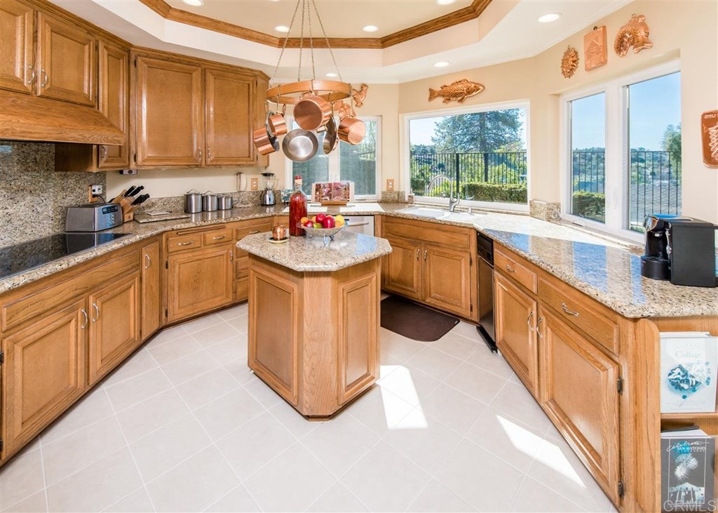 28741 Springfield Drive Laguna Niguel, CA 92677 - Photo 2 of 7 a kitchen with a sink stove and cabinets